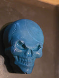 Blue skull magnet with a swipe of light blue