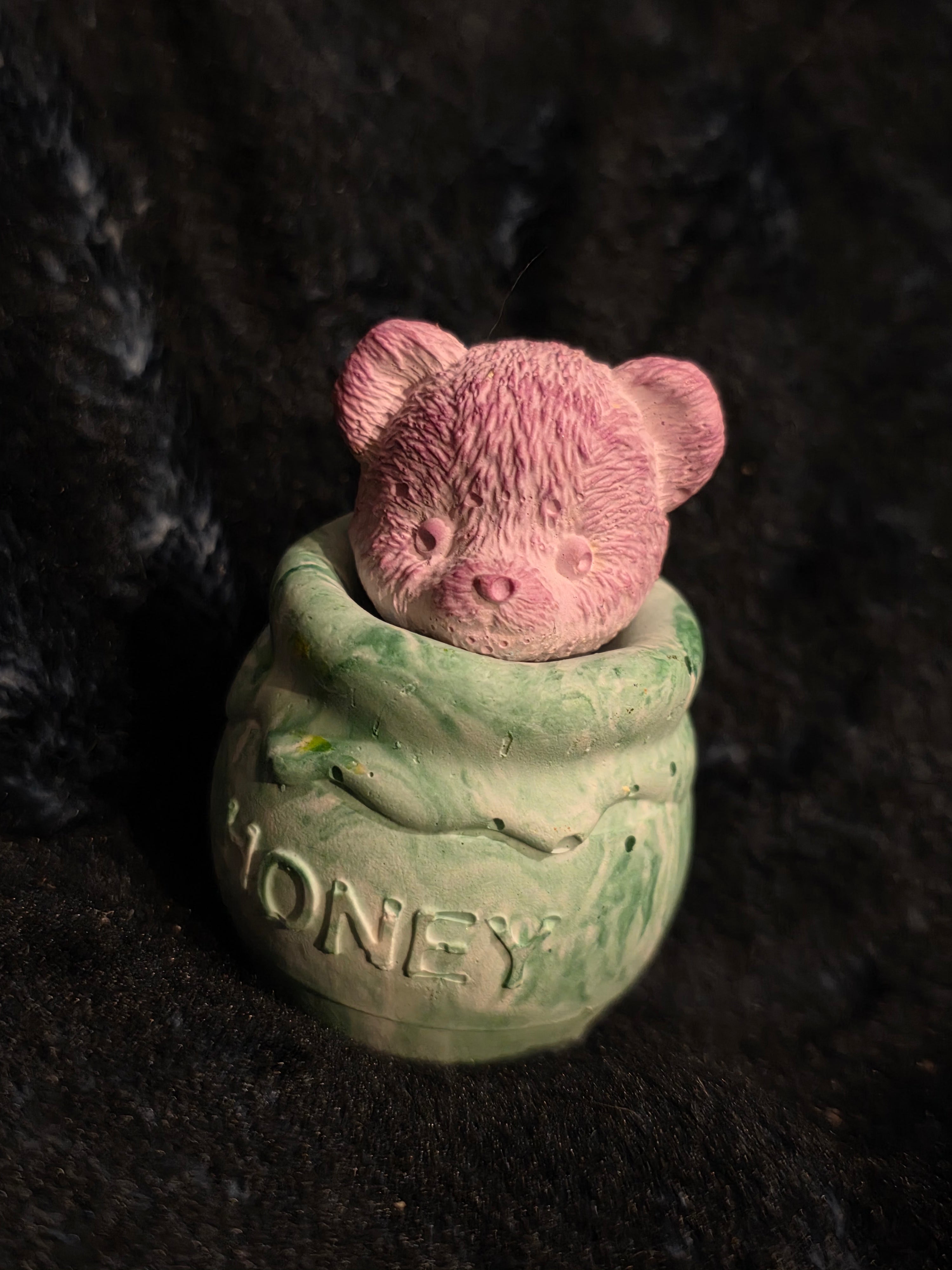 Big bear in honey pot