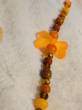 Orange Bodhi bead keychain with large bow